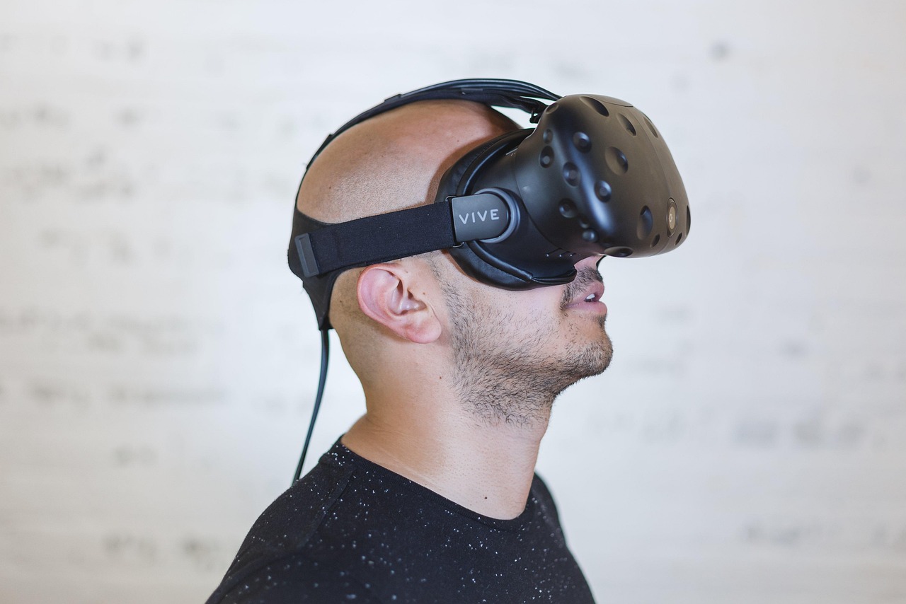 A group of friends wearing VR headsets together at an event
